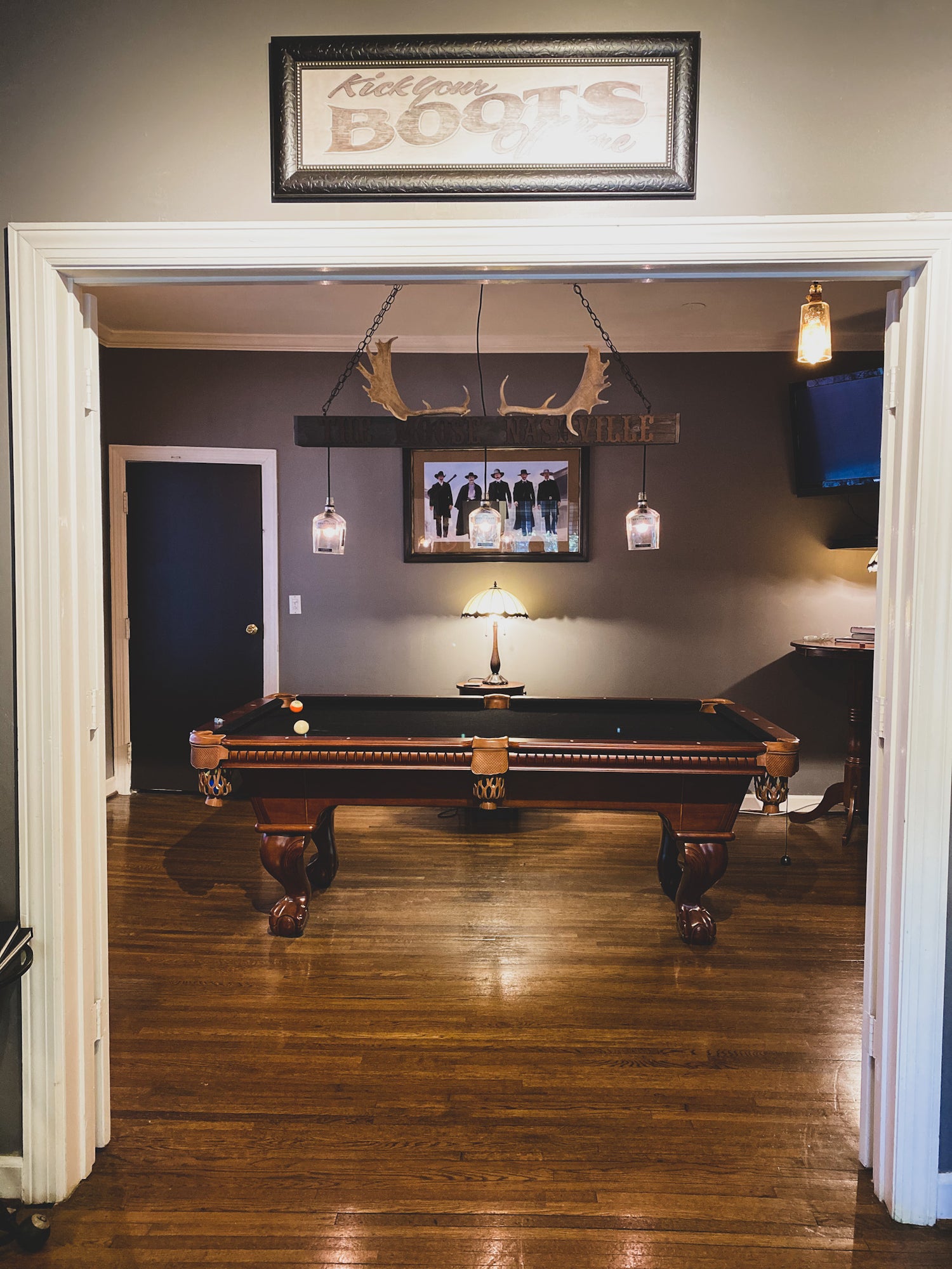 The Moose underground cigar lounge with pool table and leather chairs